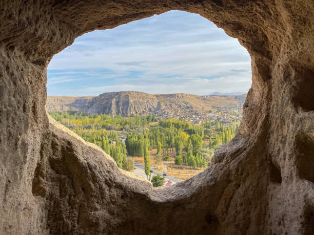 View from the round hole in the stone cave house in Cappadocia