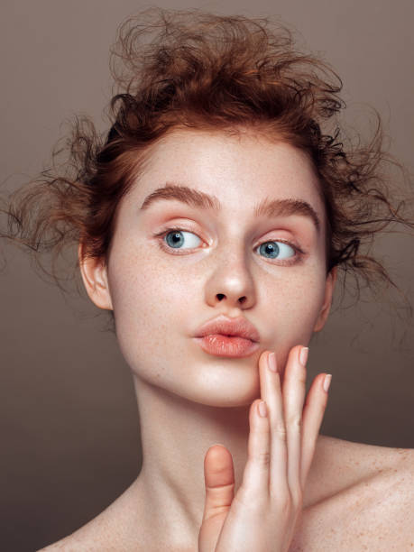 istock Beautiful emotional redhead girl 1283385957
