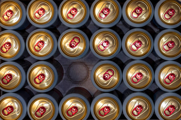 istock opened canned beer and many unopened 1283386432
