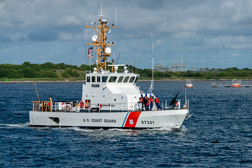 Cape Canaveral, Florida, USA - October 27, 2020: The US Coast Guard cutter USCGC Moray underway at Cape Canaveral. Her missions include counterdrug, alien migrant interdiction, ports waterways and coastal security, resource protection , law enforcement, and search and rescue operations.