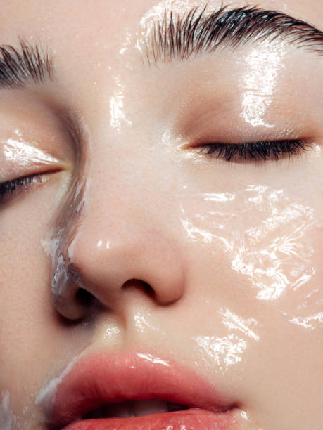 istock Beautiful young woman with moisturizing gel on her face 1283389476