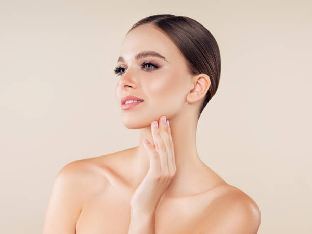 Woman with natural make-up Woman with natural make-up cheek stock pictures, royalty-free photos & images