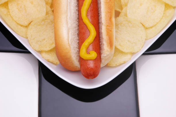 istock Hot Dog and Potato Chips 1283391511