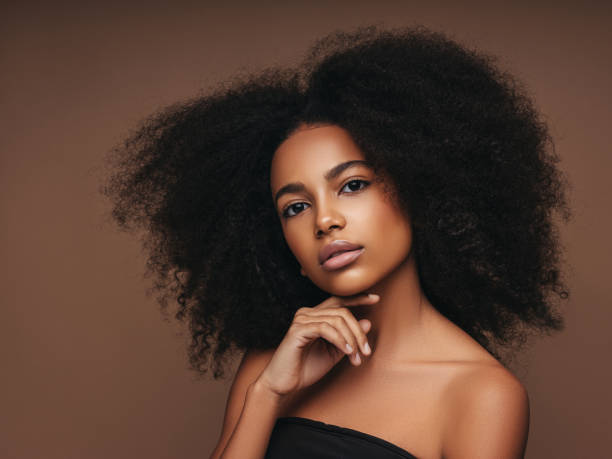 istock Beautiful girl with curly hairstyle 1283392080