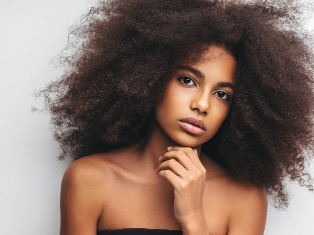 istock Beautiful girl with curly hairstyle 1283393405