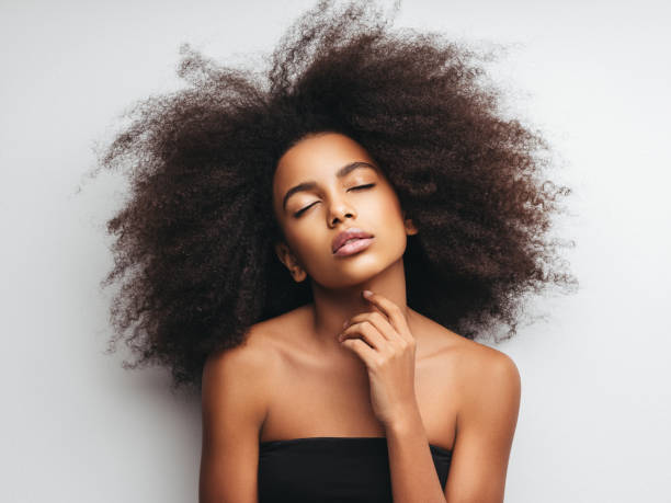 istock Beautiful girl with curly hairstyle 1283393430