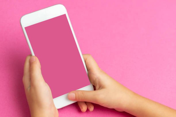 istock Little Girl Using Mobile Phone 1283393774