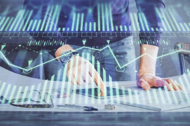 istock Double exposure of man's hand holding and using a digital device and data theme drawing. Technology concept. 1283393822