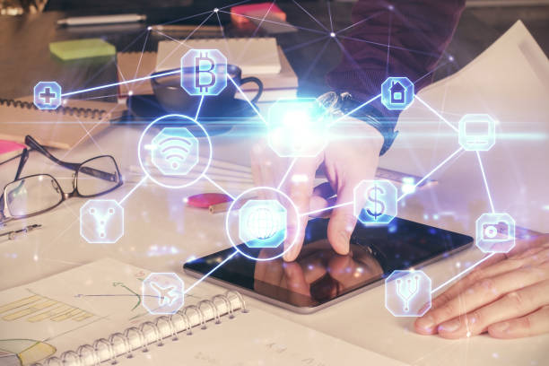 istock Double exposure of man's hands holding and using a phone and social network theme drawing. 1283393901