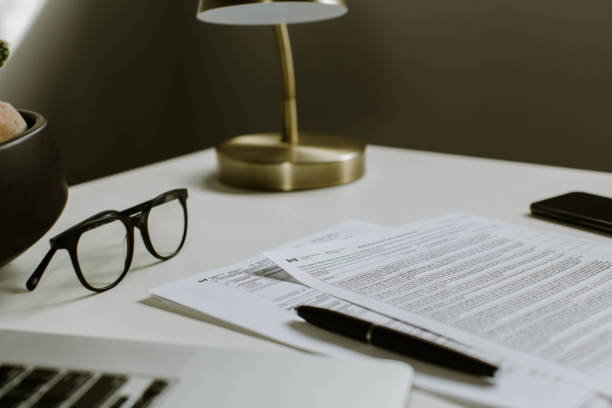 istock Filling out Canadian tax documents 1283398723