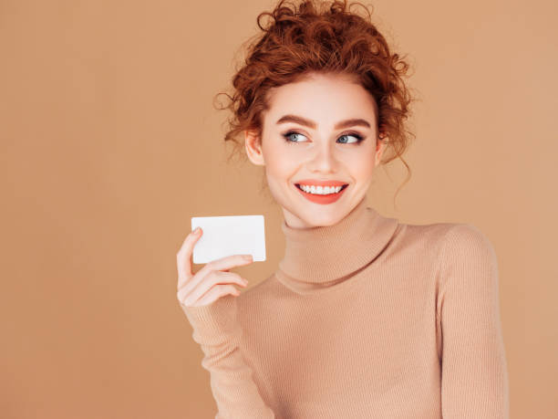 istock Beautiful woman holds placard 1283399869