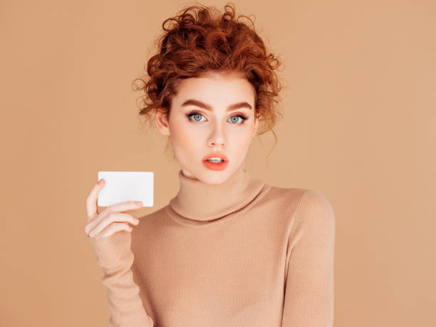 istock Beautiful woman holds placard 1283399896