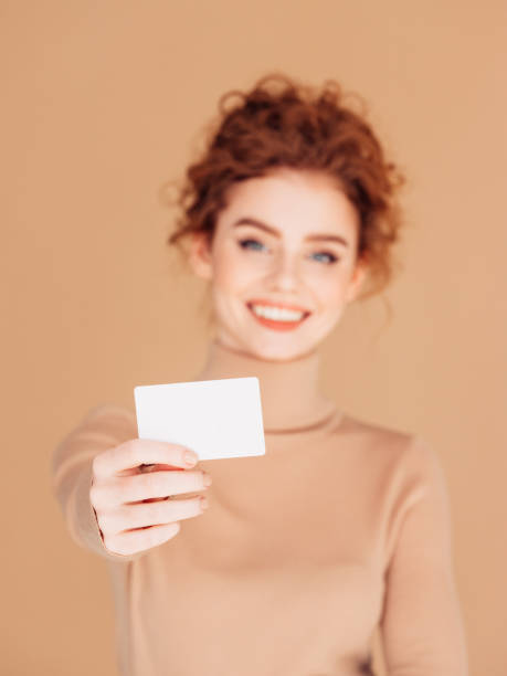 istock Beautiful woman holds placard 1283399912