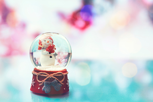 Christmas Background With Snowy Crystal Ball Ornament