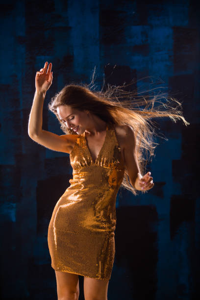 istock Dancing girl on disco party 1283403339