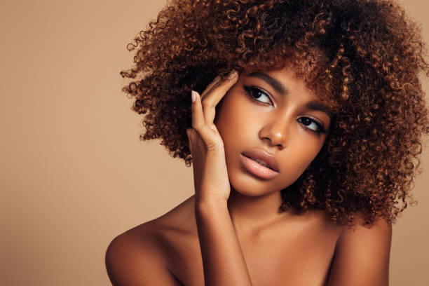 istock Beautiful girl with curly hairstyle 1283403416