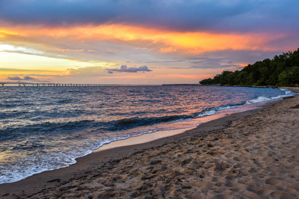 Sunset and dramatic sky at Chesapeake Bay Bridge