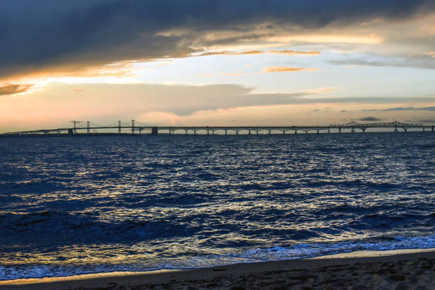 istock Sunset and dramatic sky at Chesapeake Bay Bridge 1283404529
