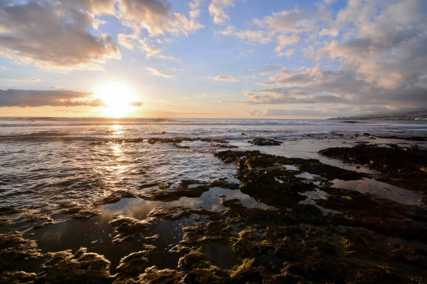 istock The Sun Setting in the Sea 1283404843