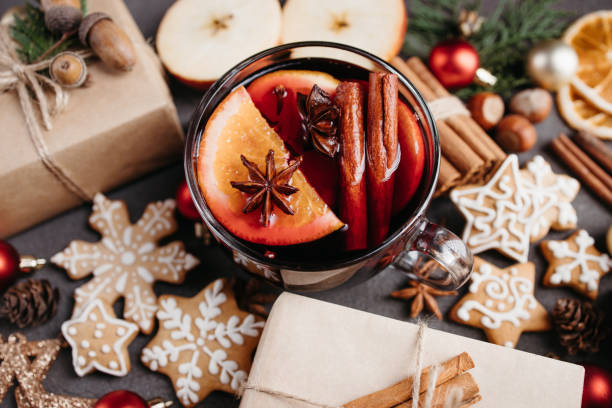 istock Holiday background with mulled wine and gift boxes 1283405902