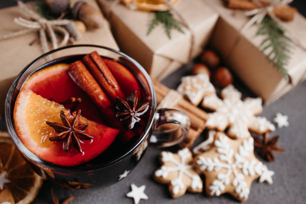 istock Holiday background with mulled wine and gift boxes 1283405915