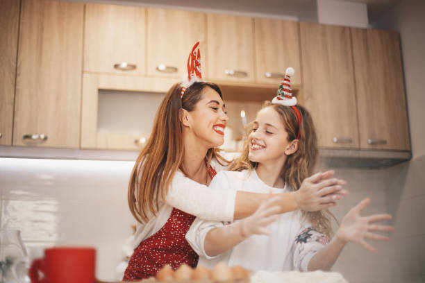 istock Two sisters playing with flour. Christmas concept. 1283406928