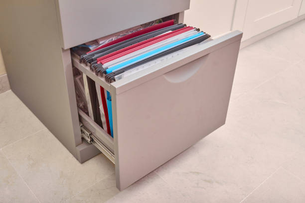 istock metal filing cabinet for storing documents, folders, subfolders and papers in an office 1283410703