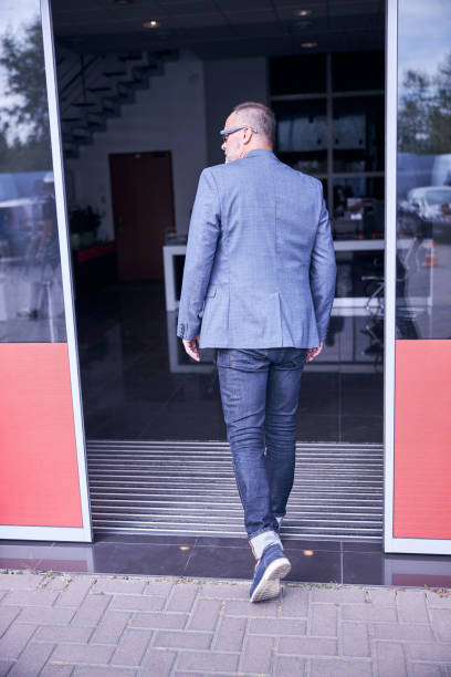 istock Elegant gentleman visiting auto repair service station 1283411738