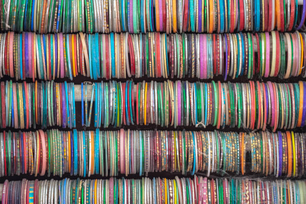istock Colourful Indian Bangles.Rows of bangles at a street side shop 1283412634