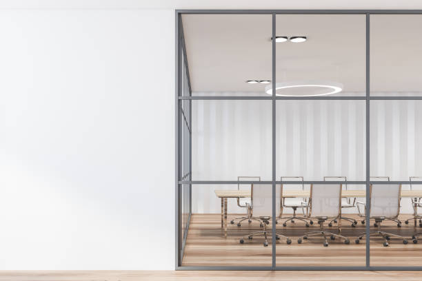 istock White meeting room with mock up wall 1283413455