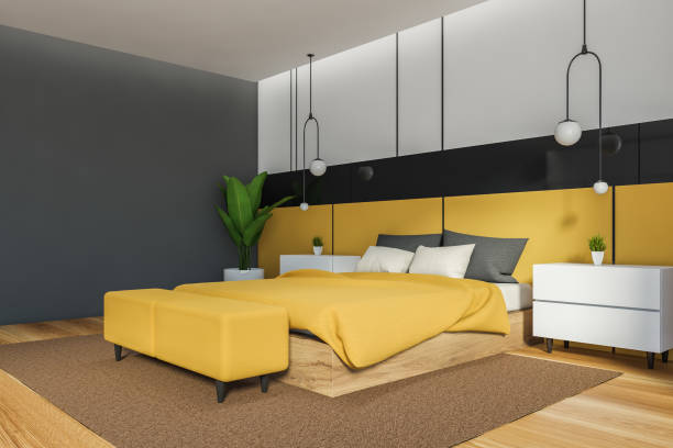 istock Yellow and gray master bedroom corner 1283413506