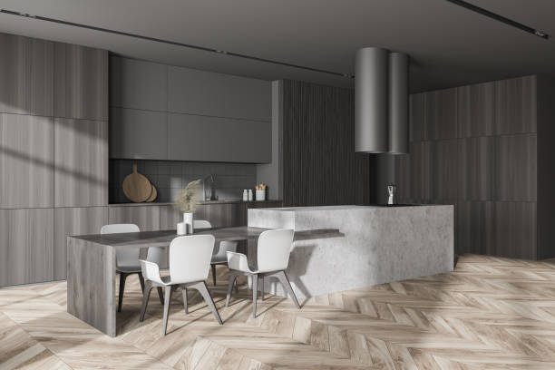 istock Modern gray and wooden kitchen corner with bar 1283413661