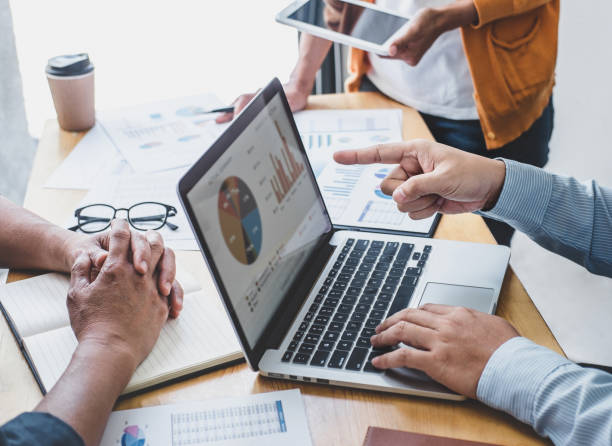 istock Business team collaboration discussing working analyzing with financial data and marketing growth report graph in team, presentation and brainstorming to strategy planning making profit of company 1283414351