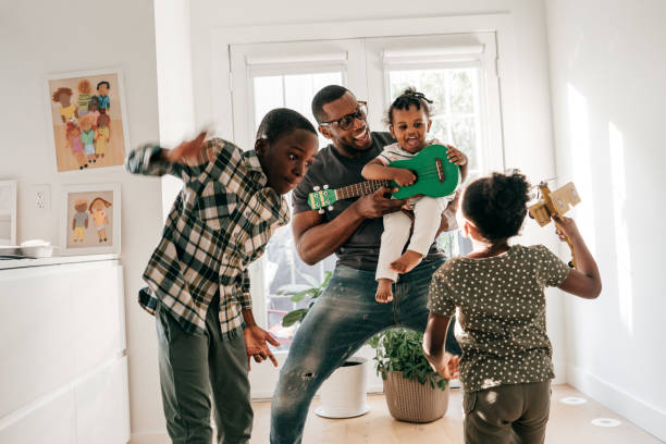 istock Dancing family at home 1283414631