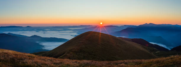 istock Sunrise in the mountains 1283414731