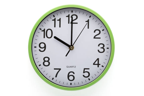 istock Ten o'clock. Wall clock showing time. Clipping path included. White background. 1283414759
