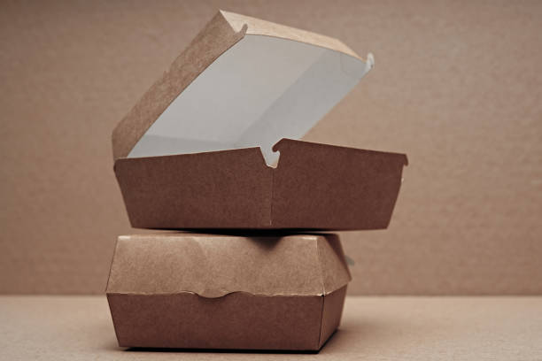 istock Paper, environmentally friendly disposable tableware for a sandwich, lunch, dessert. 1283414786
