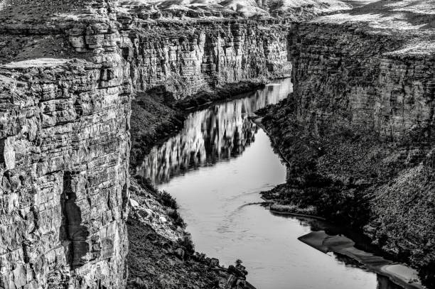 The painted wall of Black Canyon of the Gunnison in black and white.