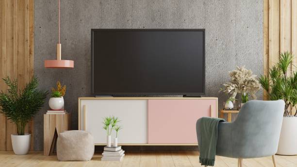 istock Smart TV on the concrete wall. 1283422567