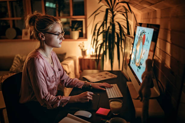 istock Young female designer working from home during pandemic 1283423081