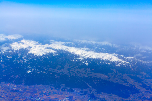 Mountain range with snowy peaks aerial view