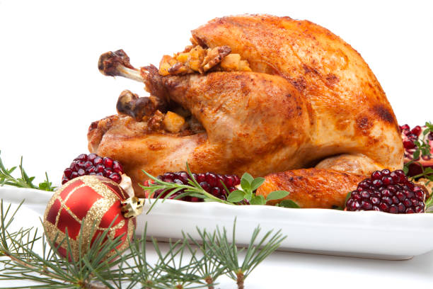 istock Pomegranate Glazed Roasted Turkey on White 1283426274