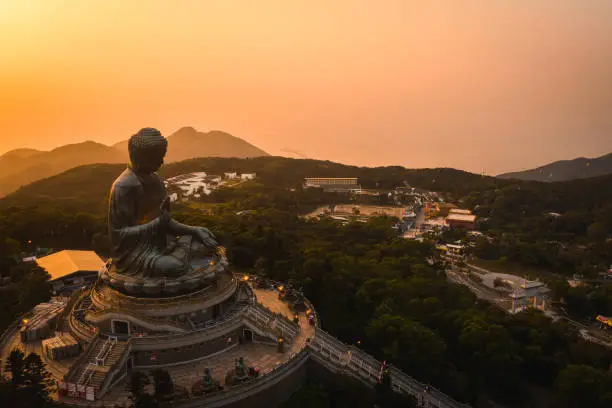 Photo of Drone view of The Big Buddha is lit in the evening