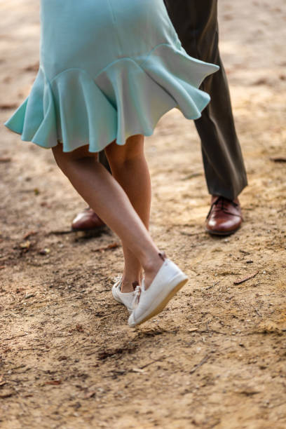 istock Charleston Dancers's legs in a park 1283431655