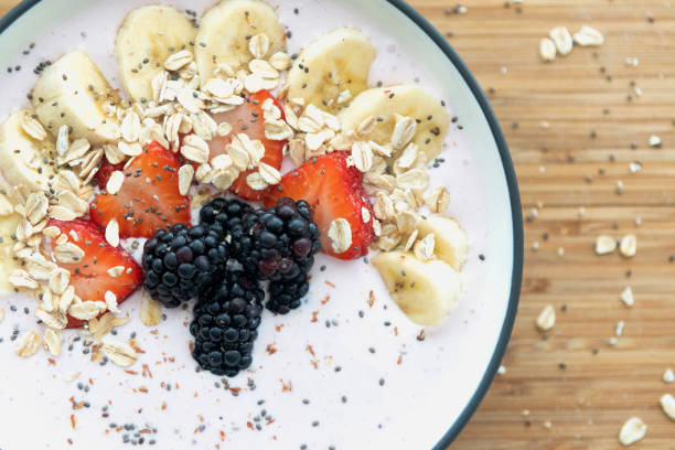istock Healthy Smoothie Bowl with Granola and Fresh Fruit 1283432693