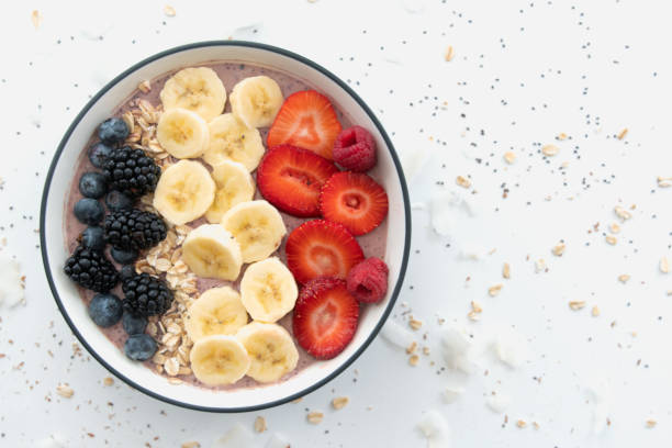 istock Healthy Smoothie Bowl with Granola and Fresh Fruit 1283432797