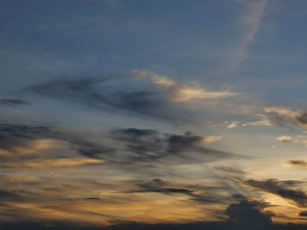 istock Cumulus cloud with sunbeam on beautiful blue sky at sunset 1283434393