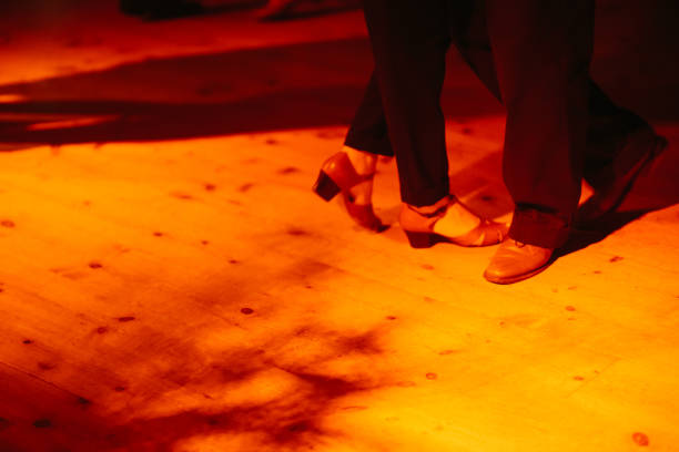 A pair of white shoes waiting at the disco.