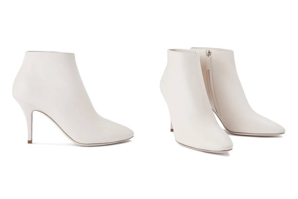 istock Female autumn boots white color 1283438950