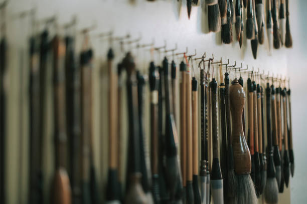 istock studio of asian chinese caligraphy artis writing instruments  hanging on wall 1283443119